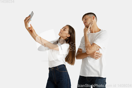 Image of Portrait of beautiful couple isolated on white studio background