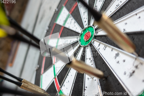 Image of a typical darts game with no dart in the bullseye