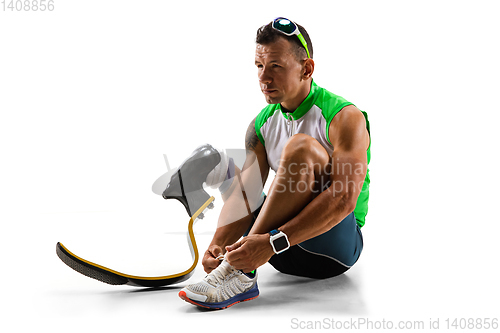 Image of Athlete disabled amputee isolated on white studio background