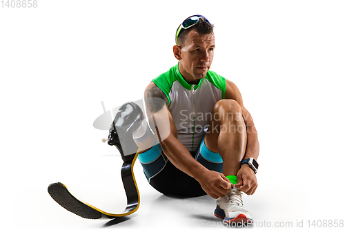 Image of Athlete disabled amputee isolated on white studio background