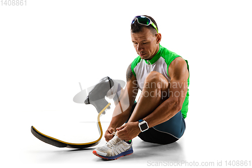 Image of Athlete disabled amputee isolated on white studio background