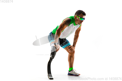 Image of Athlete disabled amputee isolated on white studio background