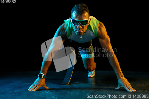 Image of Athlete disabled amputee isolated on white studio background