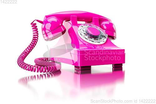 Image of old pink dial-up phone