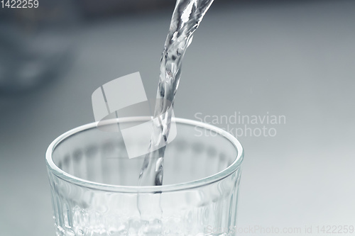 Image of pour a glass of water