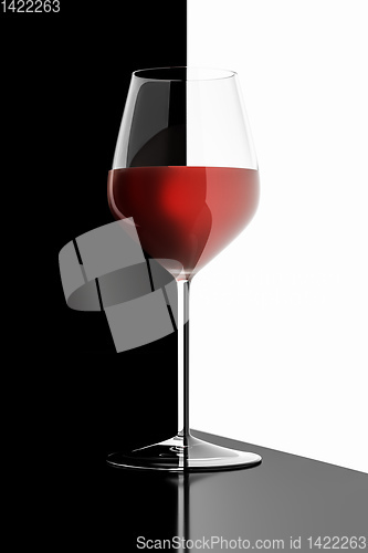 Image of glass of red wine black and white reflections
