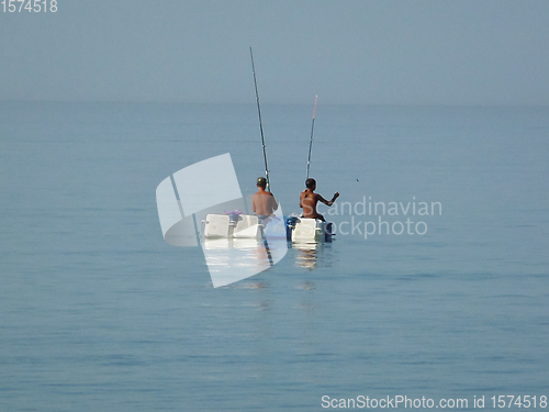 Image of Children catch fish.