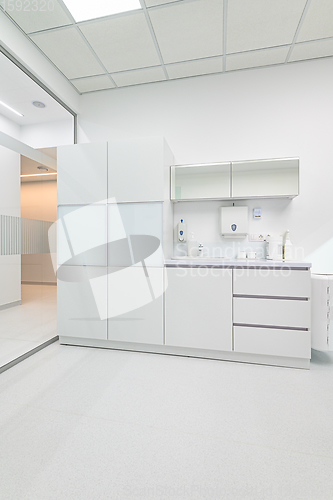 Image of White medical furniture in dentistry office