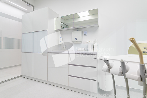 Image of White medical furniture in dentistry office