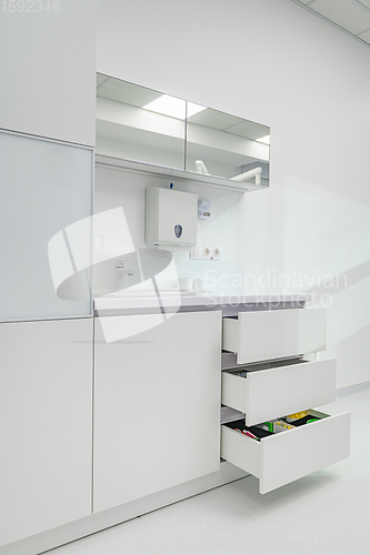 Image of White medical furniture in dentistry office