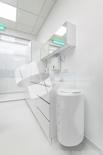 Image of White medical furniture in dentistry office