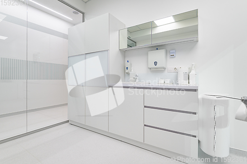 Image of White medical furniture in dentistry office