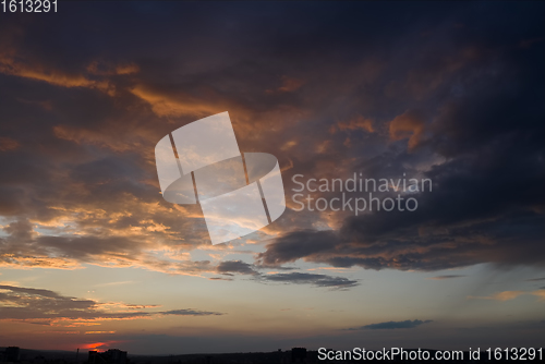 Image of dark colored sunset with clouds