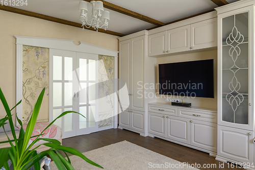 Image of Classic brown and white living room interior