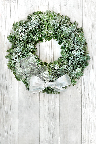 Image of Snow Covered Spruce Fir Winter Wreath 