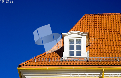 Image of Tiled roof and one window