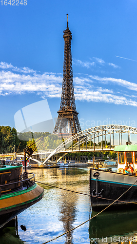 Image of Two river boats near Eiffel tower in Paris, France