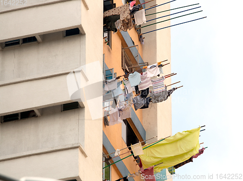 Image of Laundry drying from windows, Singapore