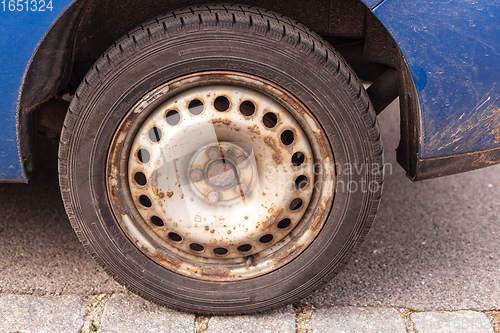 Image of Car wheel with winter tyres