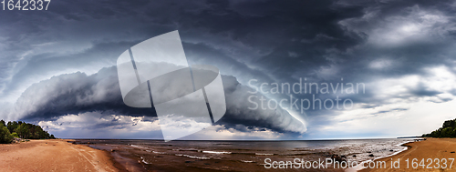 Image of Dramatic Storm Clouds over sea