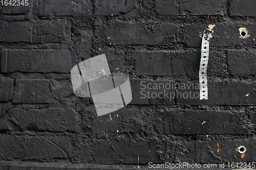Image of Black brick wall