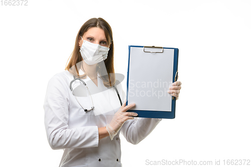 Image of Girl vrech holds a tablet in her hands with a blank sheet of paper