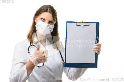 Image of Doctor showing a tablet with a blank sheet of paper and thumb up