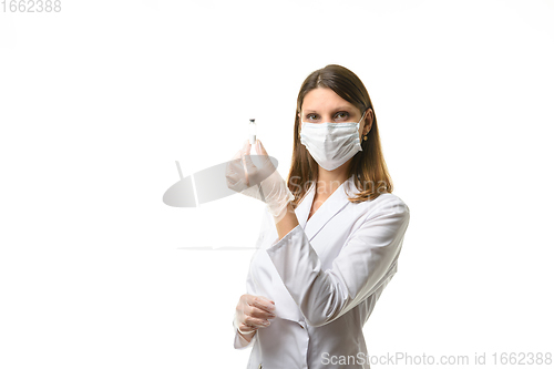 Image of Laboratory technician holds a test tube with medicine