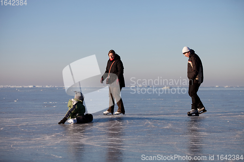 Image of Family ice skating