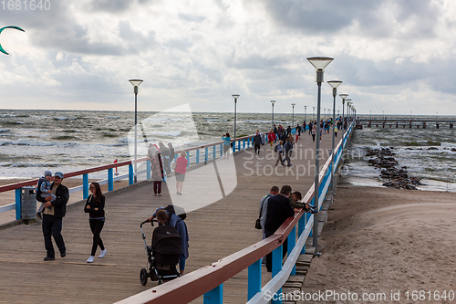 Image of Boardwalk pier in Baltic Sea udnder cloudy sky