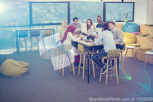 Image of Young Multiethnic Business team using virtual reality headset