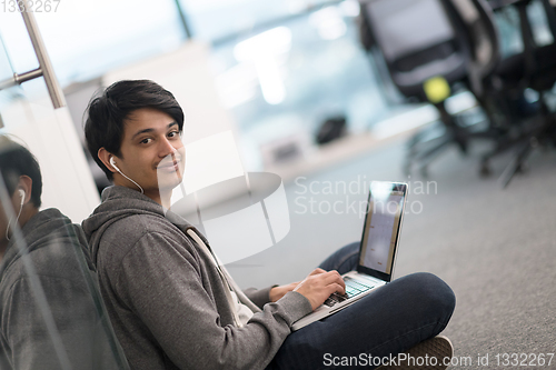 Image of software developer working on the floor