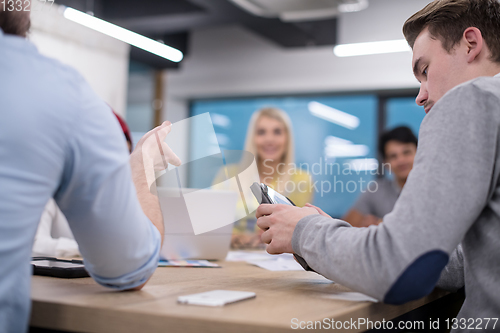 Image of Multiethnic startup business team having meeting