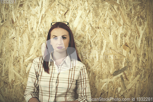 Image of portrait of young redhead business woman