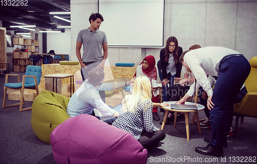 Image of Multiethnic startup business team having meeting