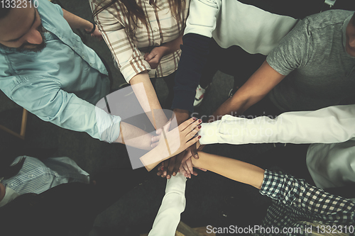 Image of multiethnic Group of young business people celebrating success