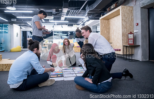 Image of black muslim woman having meeting with Multiethnic  startup busi