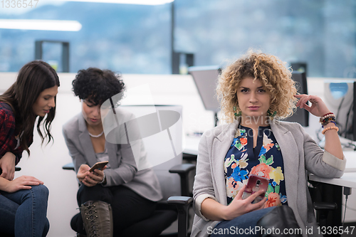 Image of Portrait of young successful female software developer