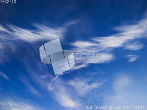 Image of Deep blue sky with white clouds