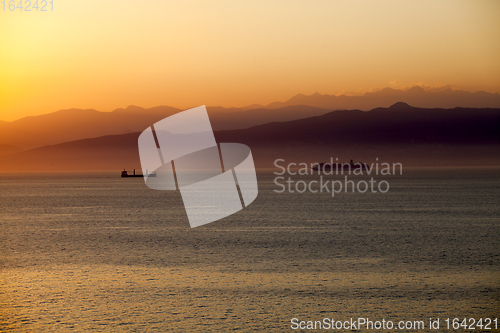 Image of Mediterranean sunset with a cruise ship
