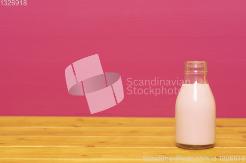 Image of Strawberry milkshake in a one-third pint glass milk bottle