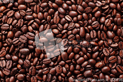 Image of Rich brown roasted coffee beans background