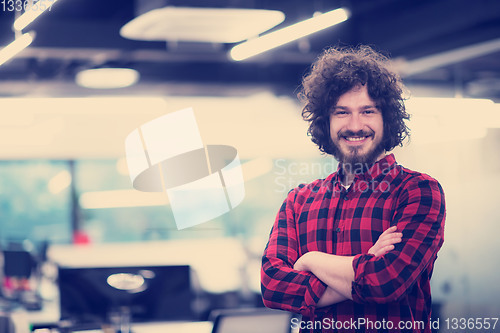 Image of Portrait of smiling male software developer
