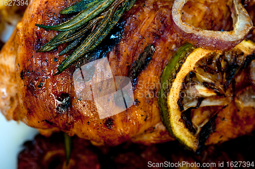 Image of roasted grilled BBQ chicken breast with herbs and spices 