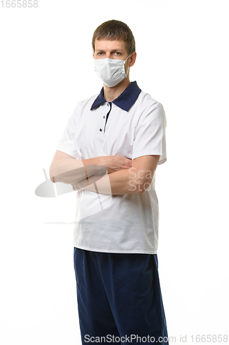 Image of Portrait of doctor with folded arms on chest isolated on white background