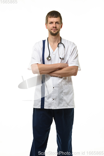 Image of Man showing doctor\'s clothes, front view, isolated on white background