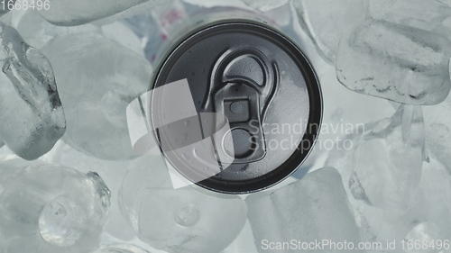 Image of Aluminum Soda Tin Can Rotating in cool Ice motion footage