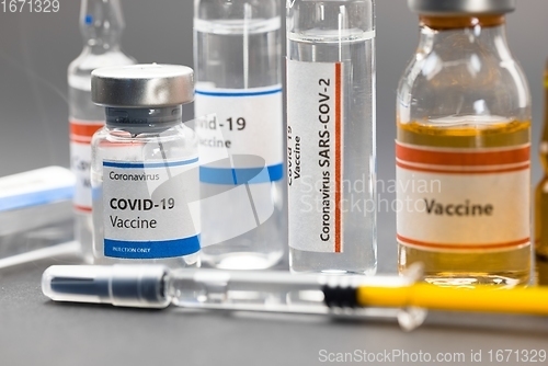 Image of Vaccine for virus in small bottles