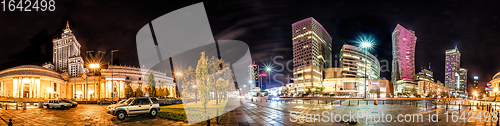 Image of Night skyline of Warsaw with soviet era and modern skyscrapers. 