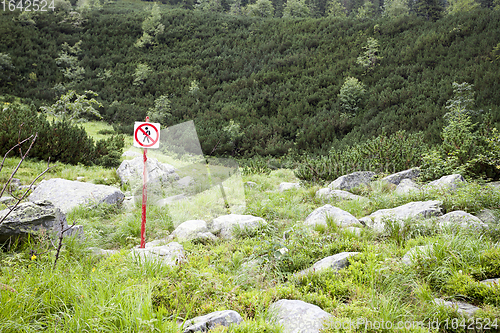 Image of No pedestrians sign in nature park